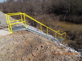Safe access steps for retention pond sampling